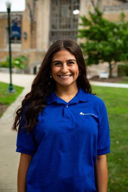 sloane head shot in EIU polo