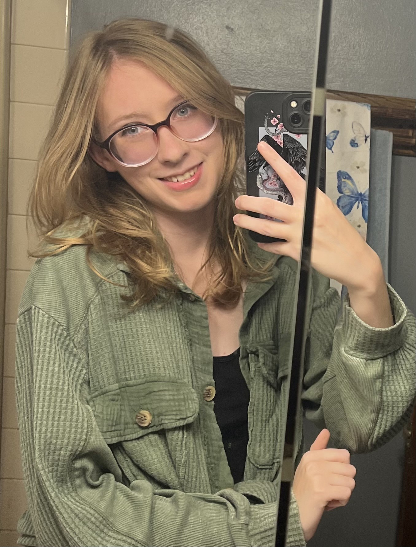 Young woman selfie with phone mirror