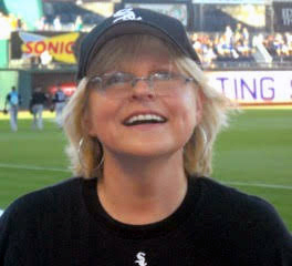 Woman in Baseball Hat