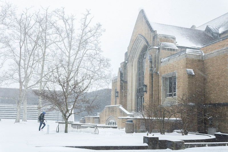 Student walking to library in snow