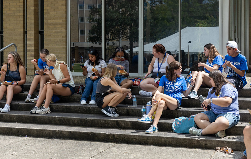 community picnic, students eating on steps