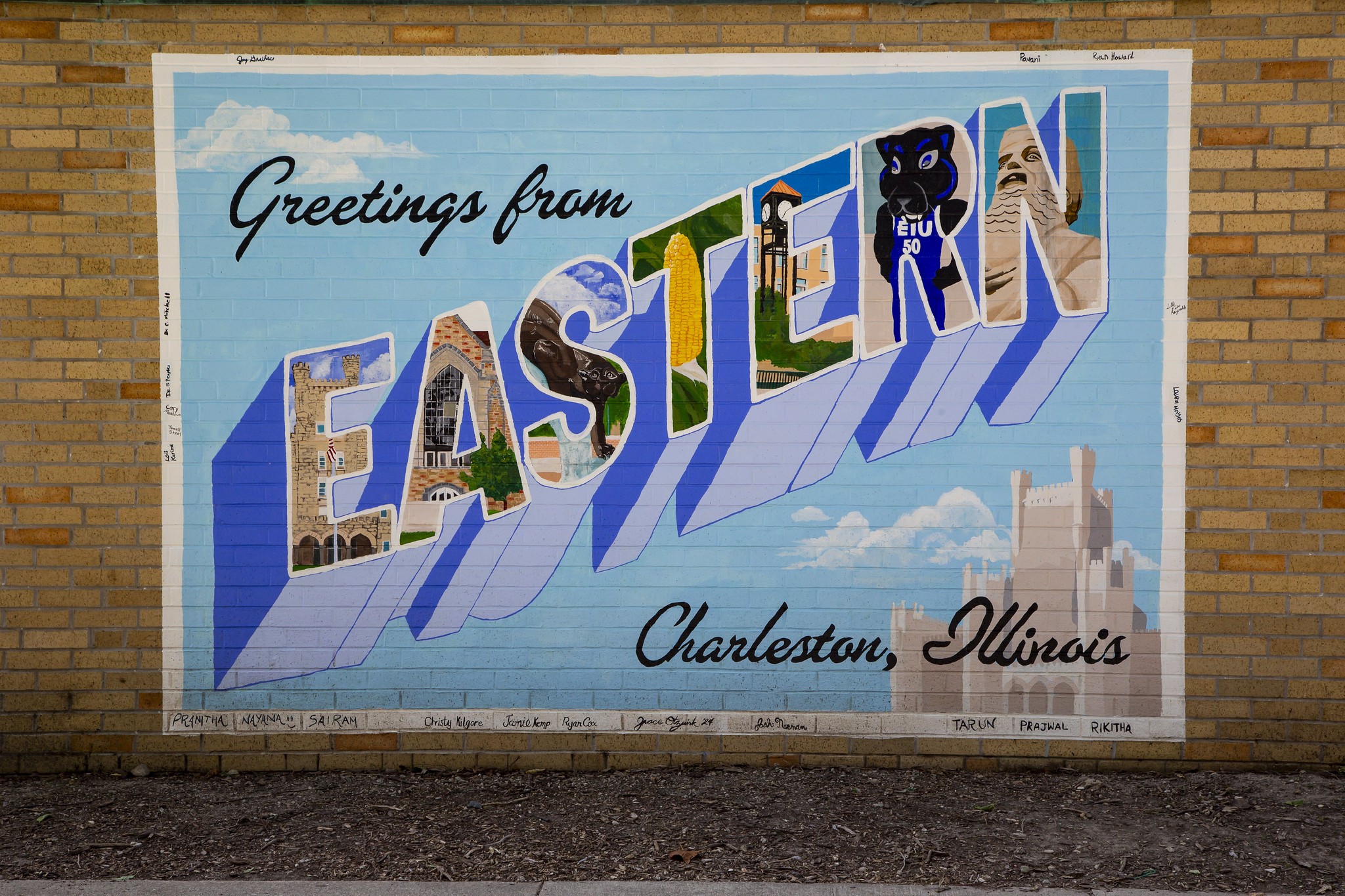 painted mural on brick wall 