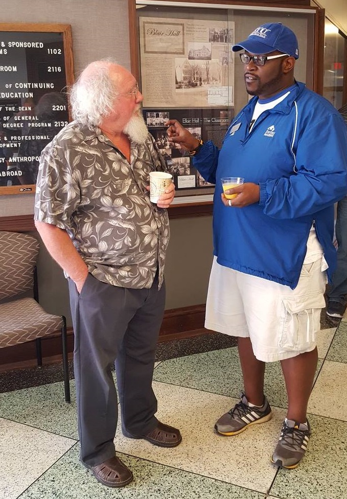 Dr. Gary Foster, Emertus Faculty, and Phillip "P.J." Thompson, Alum & member of the EIU Board of Trustees, at the 50th Anniversary Reception